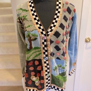 One of a kind sweater that has been tried on by me, but never worn. Size L